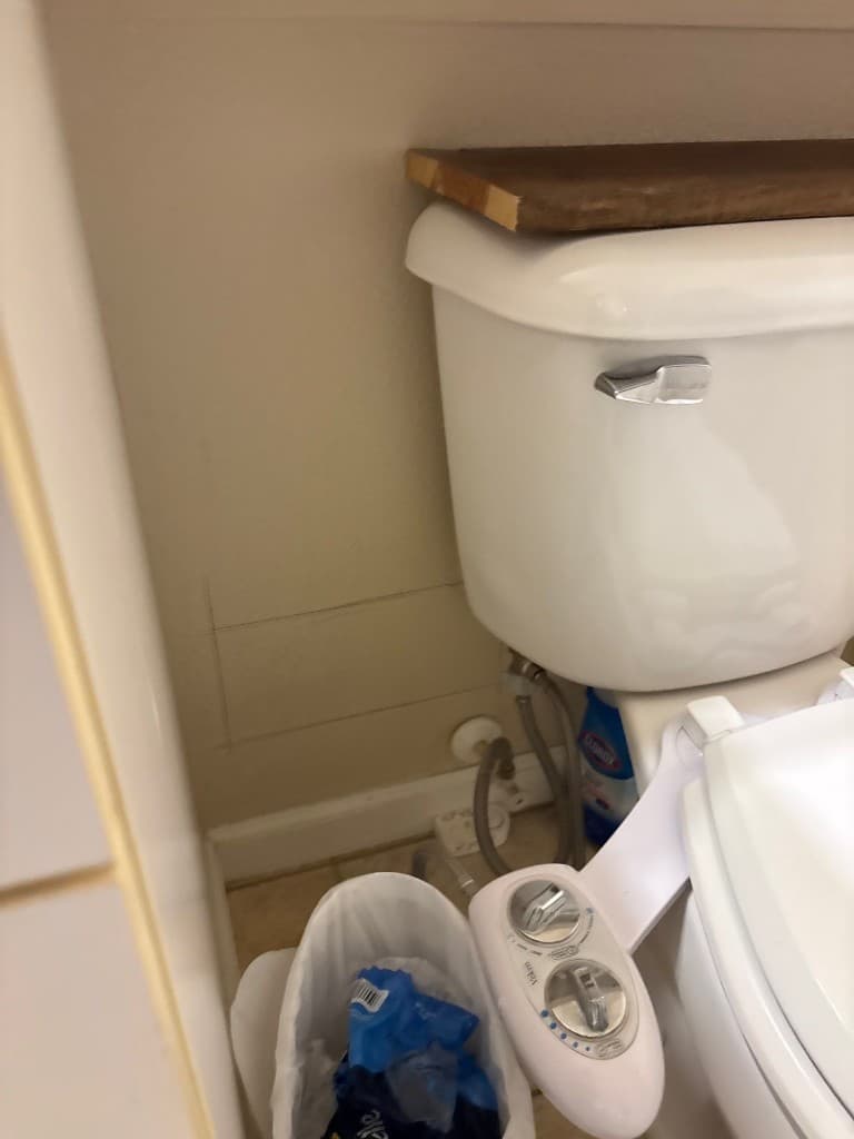 Marked wall section before access cut for a repipe project in Vancouver WA