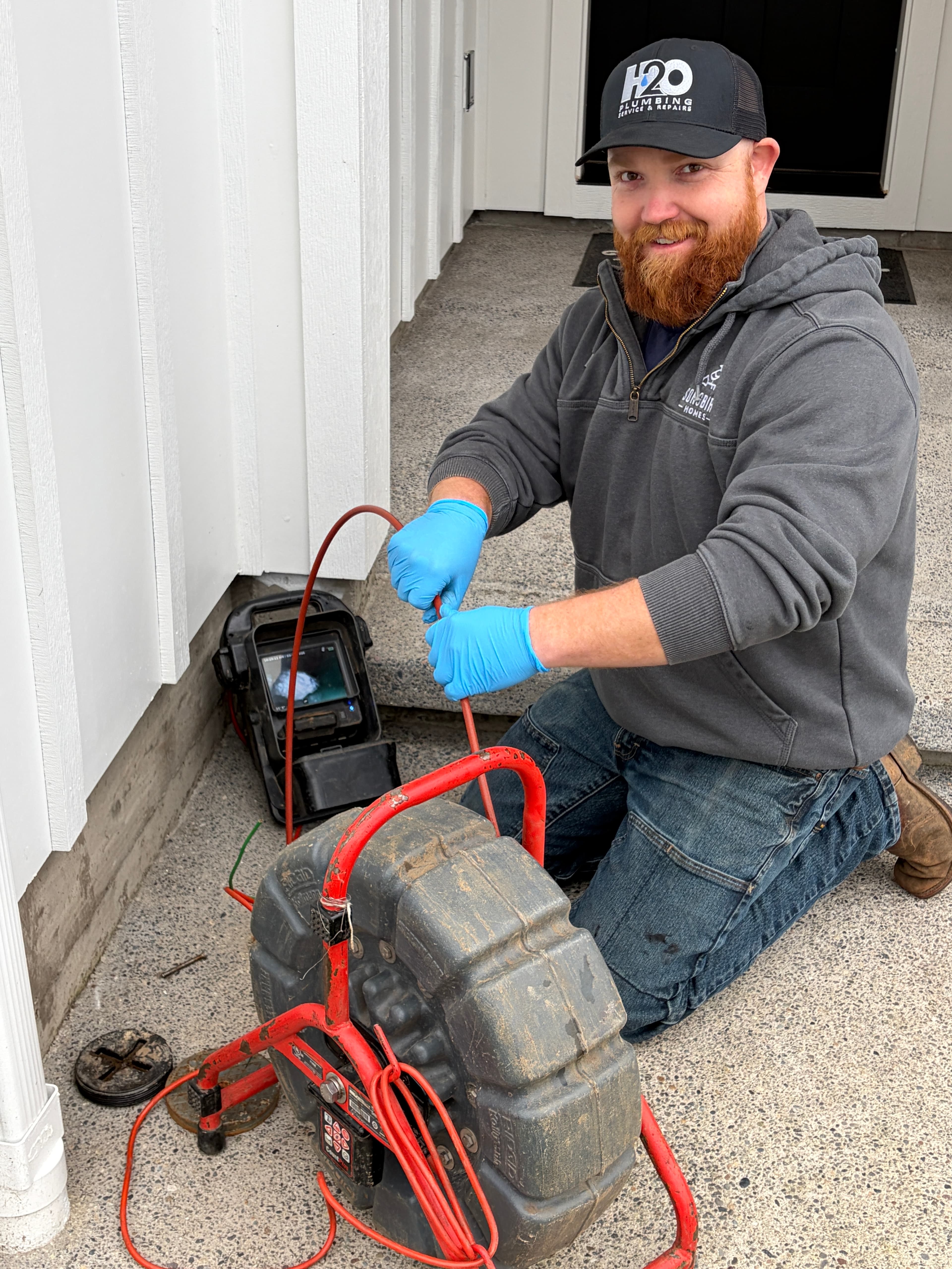 H2O technician running a sewer camera inspection